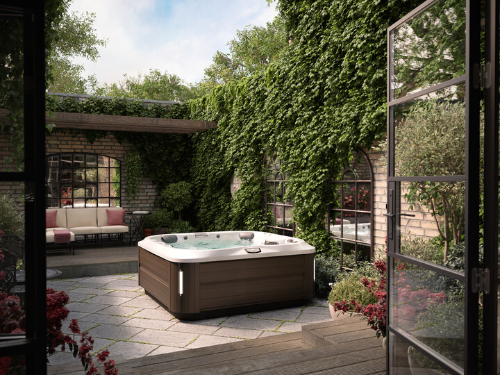 hot tub privacy ideas - stone walls and greenery 