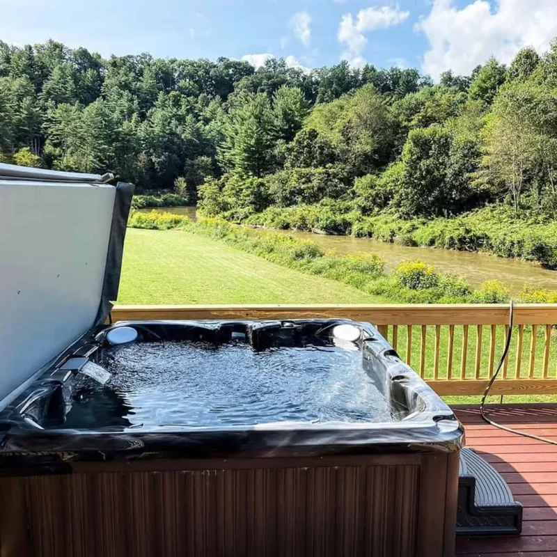 Jacuzzi-Hot-Tub-Installation Jacuzzi Hot Tub With Cover Lifter On Elevated Deck Setting
